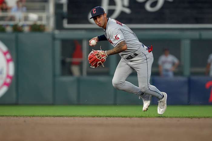 Jun 2, 2023; Minneapolis, Minnesota, USA; Cleveland Guardians shortstop Brayan Rocchio (6) fields a ball hit by the Minnesota Twins in the sixth inning at Target Field. Mandatory Credit: Bruce Kluckhohn-USA TODAY Sports